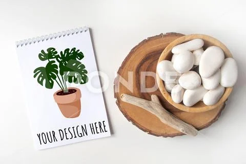 New Year empty notebook list with a bowl of white pebble PSD Template