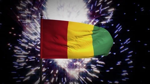 New year firework flag of Guinea Stock Footage 101347174