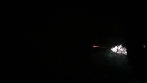 New Year Fireworks Exploding In Night Sky. Vertical Video Stock Footage 231275097