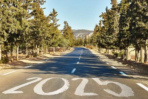 New Year Goals Concept : Empty asphalt road sunset and Happy New Year 2025 in Al Stock Photos
