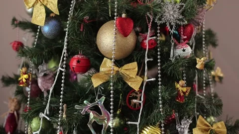New Year holiday, cans and toys, decorated Christmas tree in the house. Stock Footage 228882004