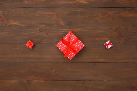 New Year. Objects isolated on table three presents in a row top view close-up Stock Photos