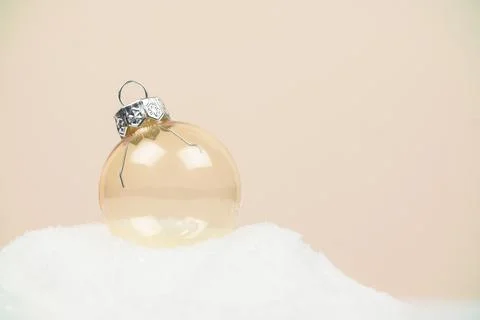 New Year or winter composition. Christmas toy for the tree in the snow Stock Photos