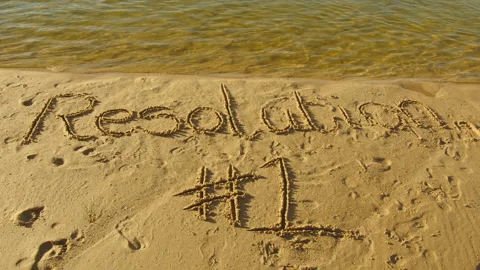 New Year resolution, NYE, on sand Stock Footage 130314066