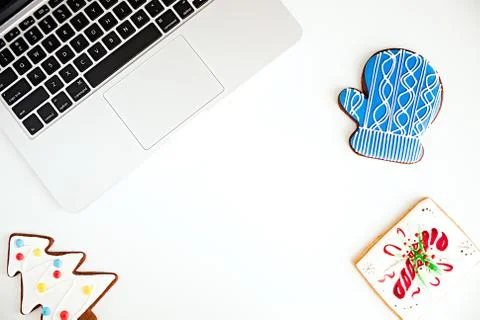 New Year resolution, planning concept - laptop and Christmas cookies Stock Photos