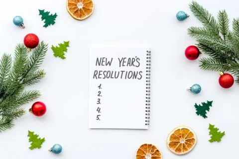 New Year Resolutions. Flat lay with Christmas decorations. Overhead view Stock Photos