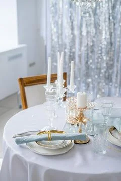New year table decor in white and silver colors Stock Photos