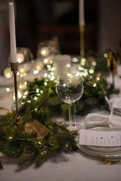 New Year table setting with lantern candles calligraphy Stock Photos