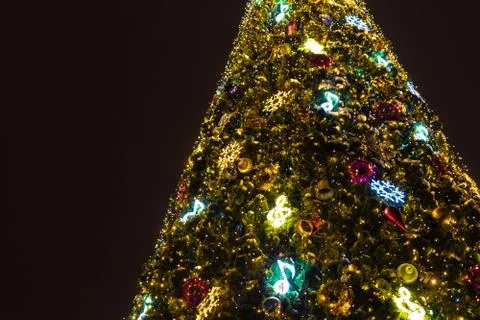New year tree, decorated with classical toys and illuminated with led lights Stock-Fotos