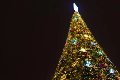New year tree, decorated with classical toys and illuminated with led lights 스톡 사진