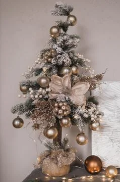 New Year tree with silver balls and bows. New Year's and Christmas. Stock Photos