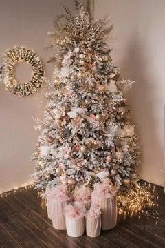 New Year tree with silver balls and bows. New Year's and Christmas. Stock Photos