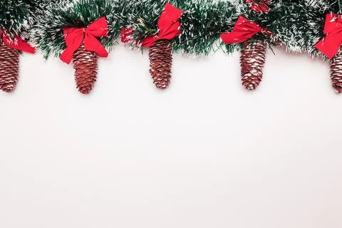 New Year Winter Background Layout Concept with pinecones, green decoration and r Stock Photos