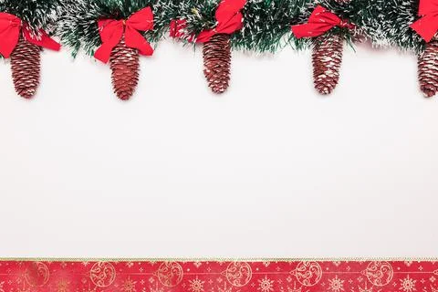 New Year Winter Background Layout Concept with pinecones, green decoration and r Stock Photos