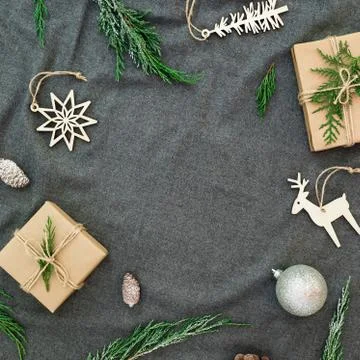 New Year winter frame concept. Christmas Nordic decorations with evergreen tr Stock Photos