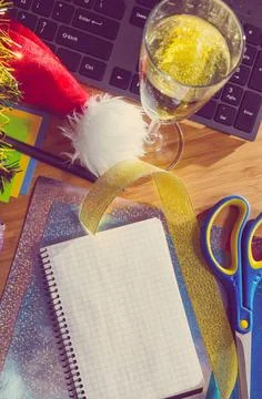 New year at work office desk with christmas accessories, wrapping paper fo... Stock Photos