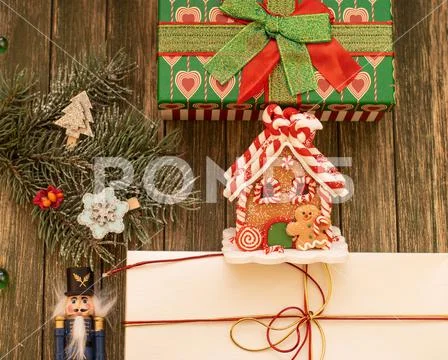 New Year's and Christmas. gift box, tree, gingerbread house Stock Photos