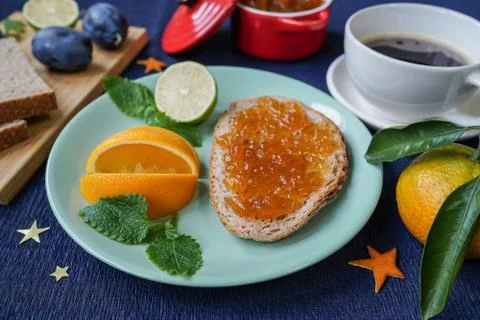 New Year's breakfast, coffee, bread, jam. Festive table setting. Stock Photos