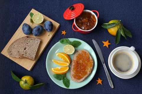 New Year's breakfast, coffee, bread, jam. Festive table setting. Stock Photos