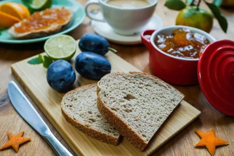 New Year's breakfast, coffee, bread, jam. Festive table setting. Stock Photos