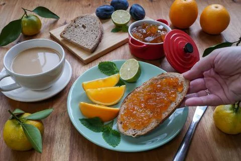 New Year's breakfast, coffee, bread, jam. Festive table setting. Stock Photos