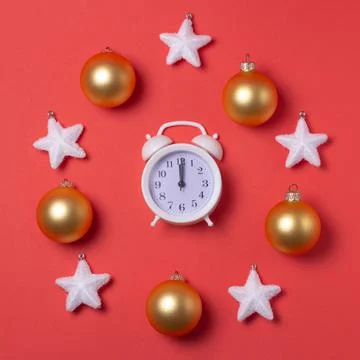 New year's circular composition of a clock in the center, snow-white stars an Stock Photos