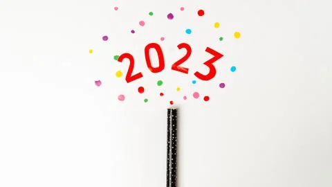 New Year's clapperboard with multi-colored confetti and the number 2023 on a  Stock Photos