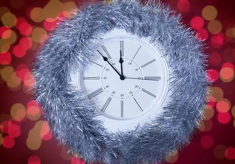 New Year's clock on a red background Stock Photos