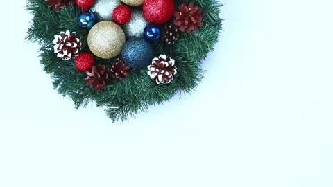 New Year's composition from a Christmas wreath and Christmas toys Stock Footage 221147713