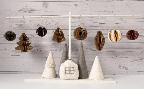 New Year's composition with eco-friendly paper toys and knitted Christmas tre Stock Photos
