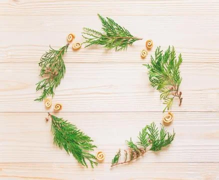 New Year's composition. Frame for text with Christmas tree and cones on a woo Stock Photos