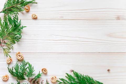 New Year's composition. Frame for text with Christmas tree and cones on a woo Stock Photos