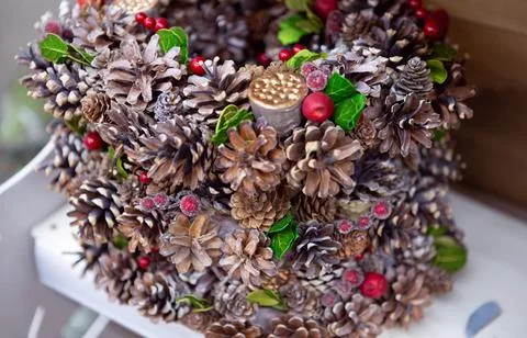 New year's composition of pine cones, viburnum and Rowan berries Stock Photos