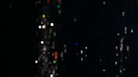 New Year's confetti on a black background Stock Footage 69764321