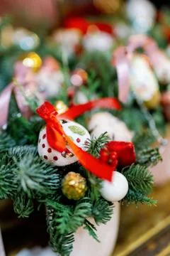 New Year's decor and compositions. A bouquet of fir branches with balls, spar Stock Photos