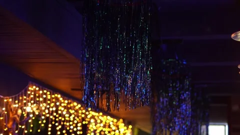 A New Year's decoration hangs on the ceiling of a nightclub Stock Footage 324168628