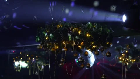 A New Year's decoration hangs on the ceiling of a nightclub Stock Footage 324984250