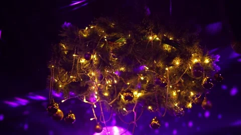 A New Year's decoration hangs on the ceiling of a nightclub Stock Footage 325091386