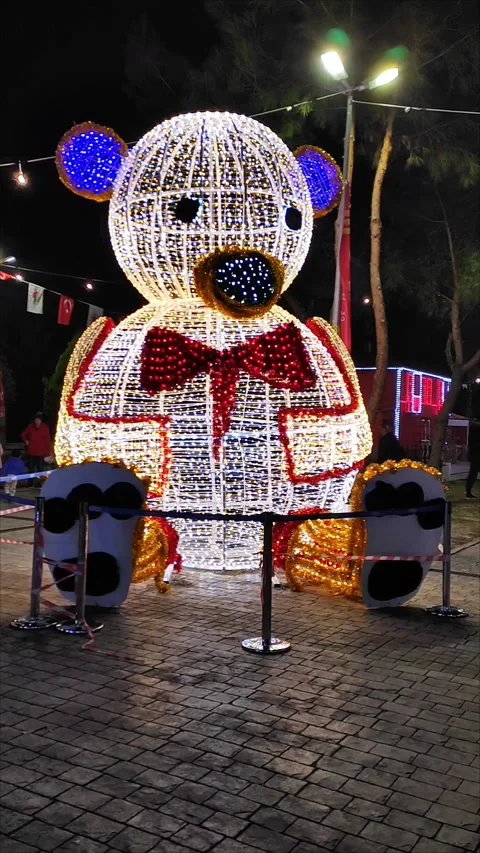 New Year's Eve light installation in the form of a toy bear Stock Footage 320406503