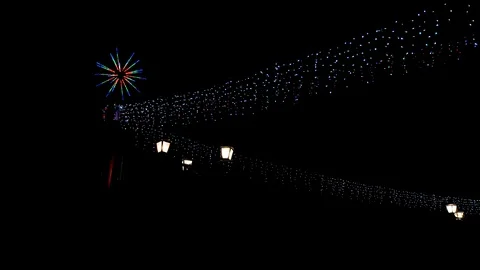 On New Year's Eve, multi-colored lanterns are burning on the street. Stock Footage 120782317
