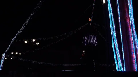 On New Year's Eve, multi-colored lanterns are burning on the street. Stock Footage 120782922