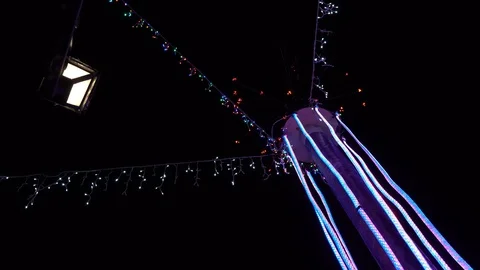 On New Year's Eve, multi-colored lanterns are burning on the street. Stock Footage 120782939