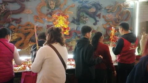 On New Year's Eve, people go to temples to burn incense and pray for blessings Stock Footage 300318567