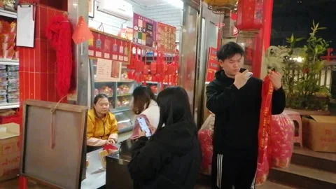 On New Year's Eve, people go to temples to burn incense and pray for blessings Stock Footage 300318739