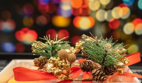 New Year's gift on the background of multi-colored blurred background Stock Photos