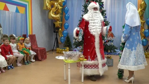 New Year's holiday in kindergarten. Children have fun, arrange a performance Stock Footage