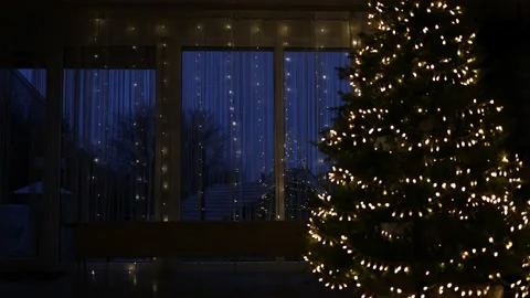 New Year's illumination on windows and Christmas tree Stock Footage 167795525