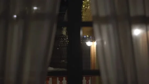 New Year's lights in the evening outside the window Stock Footage 236014657