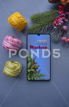 New year's picture of a smartphone for a needlework store. Mockup PSD PSD Template
