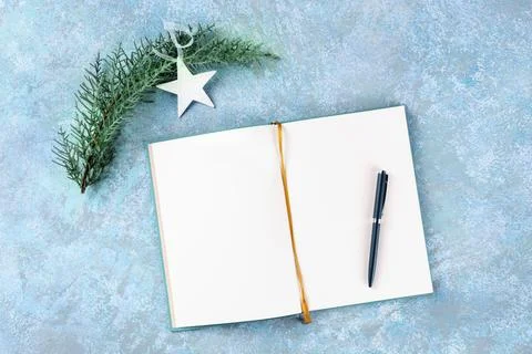 New Year's resolutions, flat lay overhead shot with copy space, on a blue Stock Photos